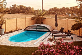 Pool, Sauna und Blick ins Grüne